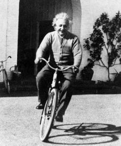 Albert Einstein on a bicycle in Niels Bohr's garden